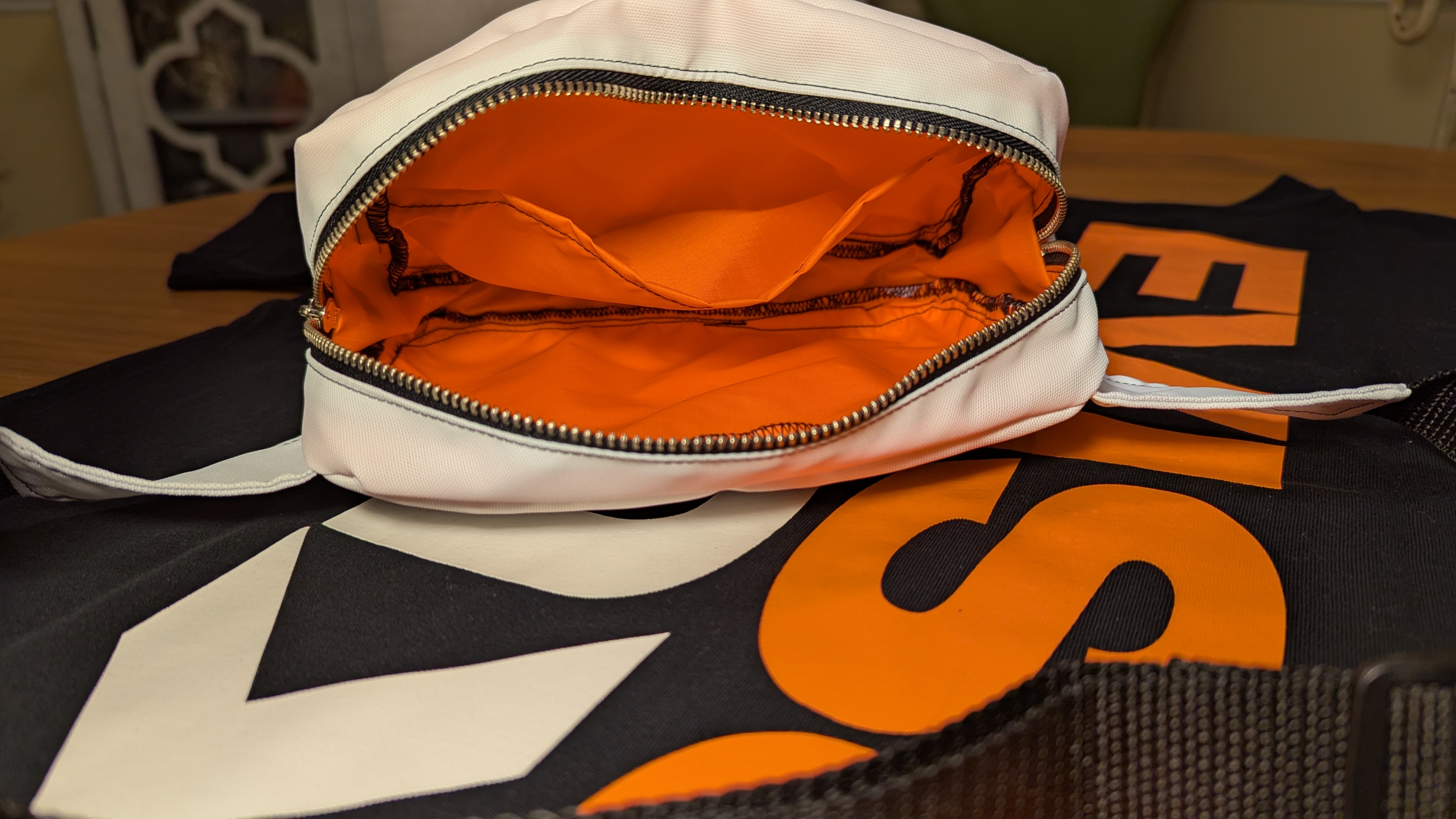 Fanny pack open showing orange interior